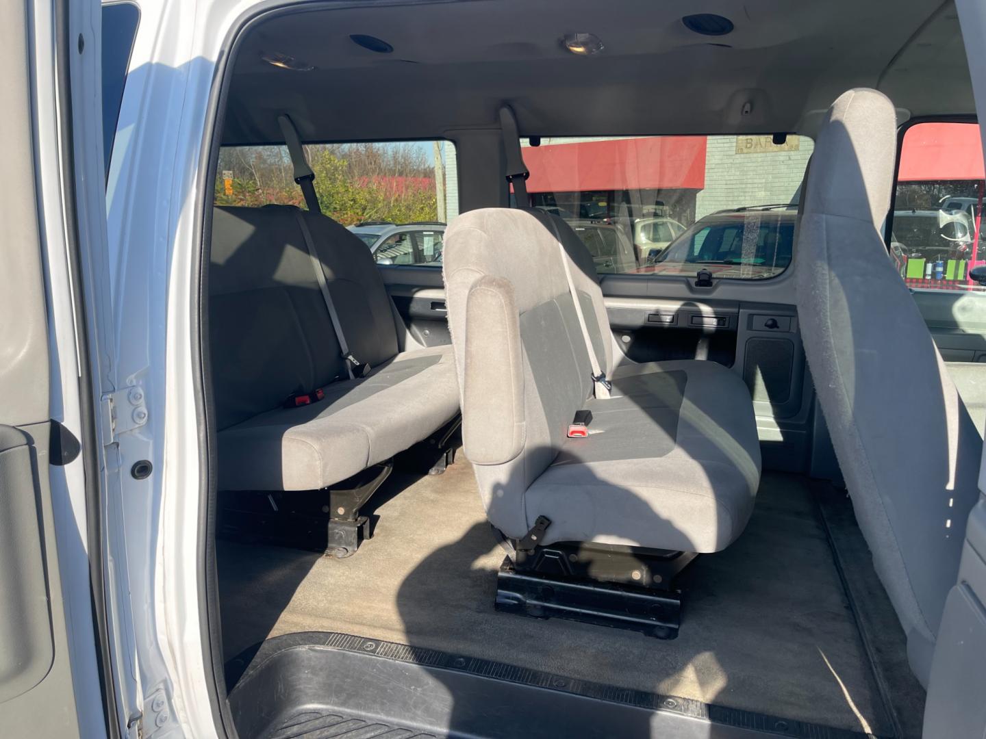 2013 White /Gray Ford E-Series Wagon E-350 XLT Super Duty Extended (1FBSS3BL8DD) with an 5.4L V8 SOHC 16V FFV engine, 4-Speed Automatic transmission, located at 547 E. Main St., Orwell, OH, 44076, (440) 437-5893, 41.535435, -80.847855 - Photo#33